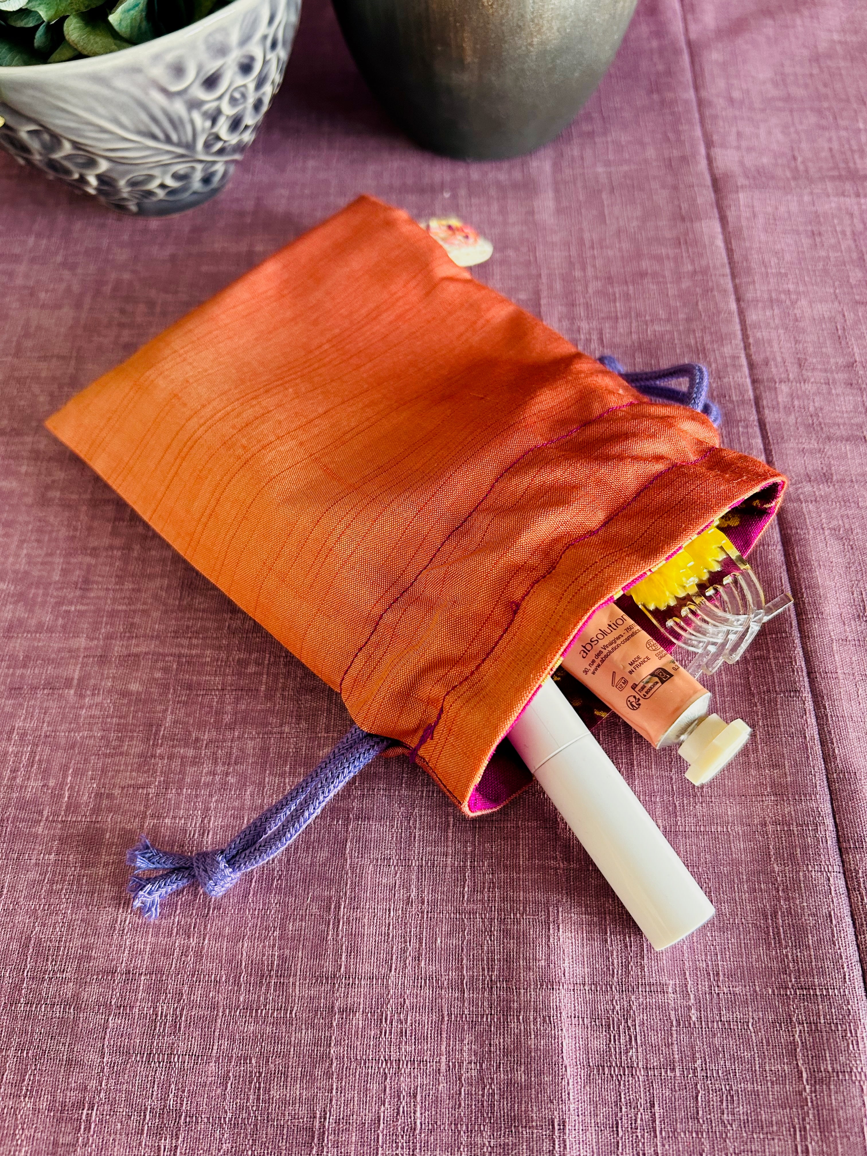 巾着ポーチ - オレンジ＆ピンクのきらめき（小）